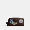 Coach Large Travel Kit In Signature Canvas With Travel Patches