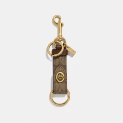 Coach Trigger Snap Bag Charm In Signature Canvas